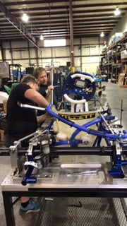 Back of an Energy Kart on a Zero Error Racing Frame Table.